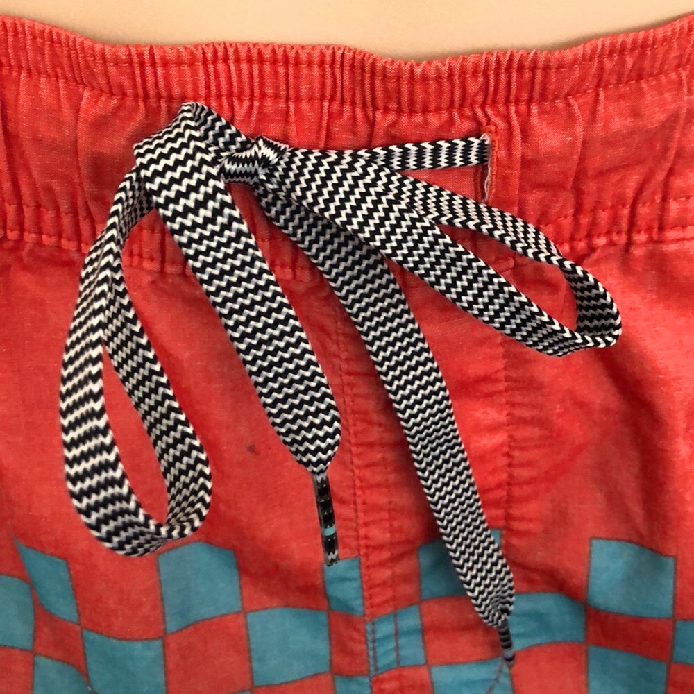C/ / Y / A Men’s swim trunks Size Sml orange& turq